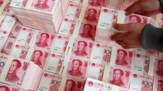 چرا چین تلاش می کند ارزش پول خود را پایین نگه دارد؟